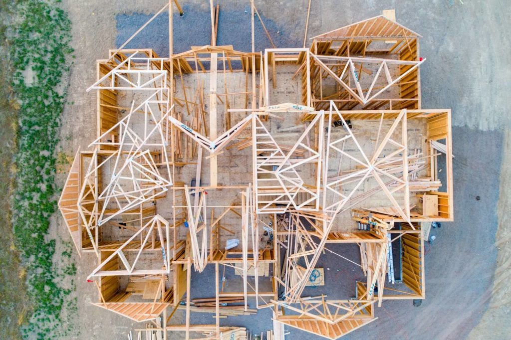 6 Stages Of Building A House Aerial View Of House Framework